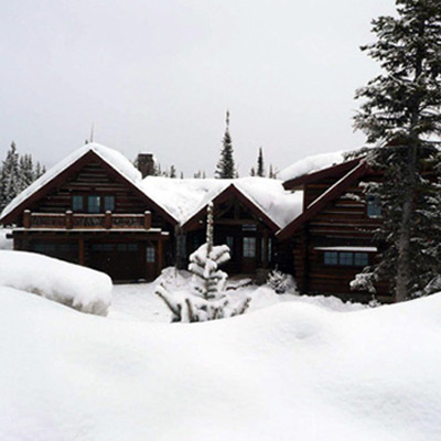 Big Sky MT Custom Log Home In Winter